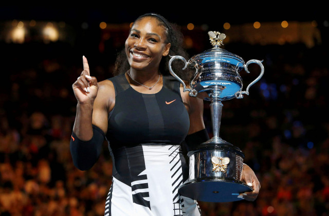 serena williams holding her australian open trophy photo reuters serena williams holding her australian open trophy photo reuters
