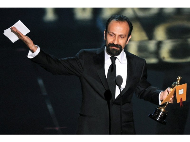 director asghar farhadi collects an oscar for a separation photo afp director asghar farhadi collects an oscar for a separation photo afp