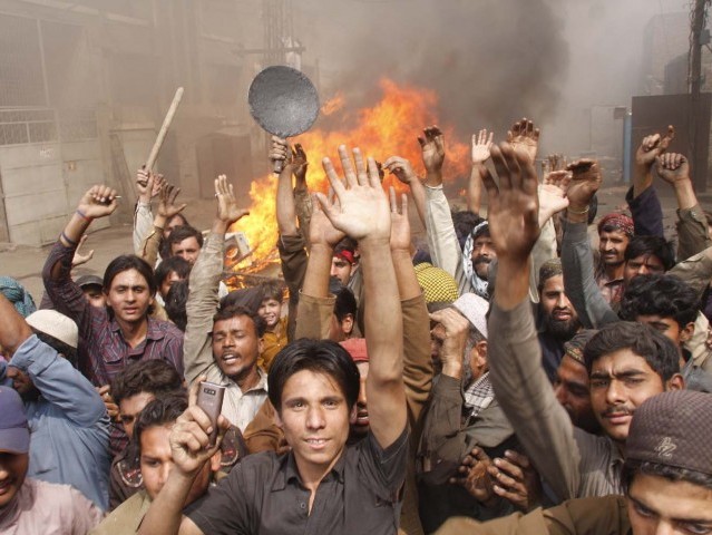 the angry mob which destroyed many houses in the joseph colony photo abid nawaz express