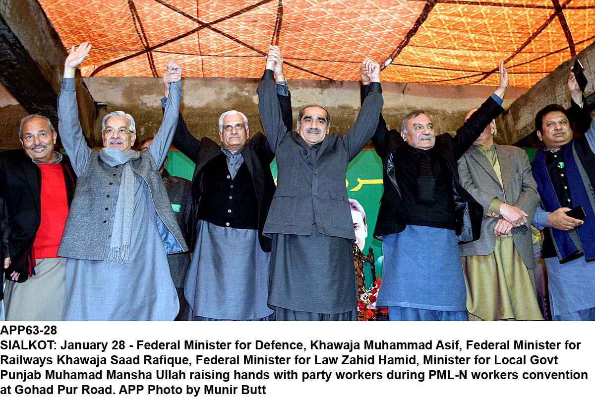 khawaja asif khawaja saad rafique zahid hamid muhammad mansha ullah raising hands with party workers during pml n workers convention photo app