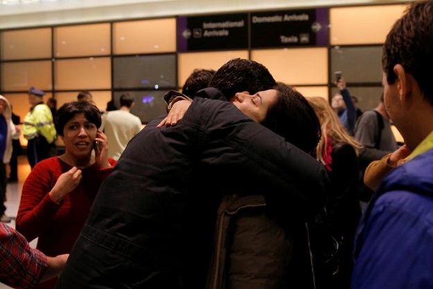 mazdak tootkaboni l is reunited with friends and family after he was separated from other passengers and questioned as a result of u s donald trump 039 s executive order travel ban at logan airport in boston massachusetts u s january 28 2017 tootkaboni an iranian with a u s green card is a professor at the university of massachusetts dartmouth umass photo reuters