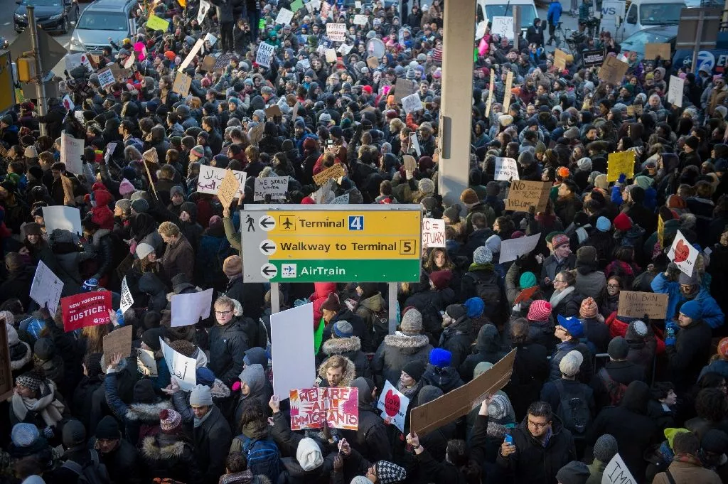 demonstrators at jfk international airport protest president donald trump 039 s executive order suspending refugee arrivals and imposing tough controls on some travellers photo afp demonstrators at jfk international airport protest president donald trump 039 s executive order suspending refugee arrivals and imposing tough controls on some travellers photo afp