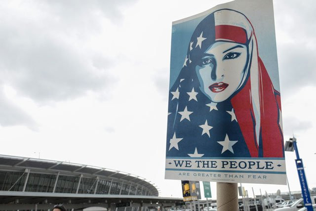 protestors rally during a protest against the muslim immigration ban at john f kennedy international airport on january 28 2017 in new york city photo afp protestors rally during a protest against the muslim immigration ban at john f kennedy international airport on january 28 2017 in new york city photo afp