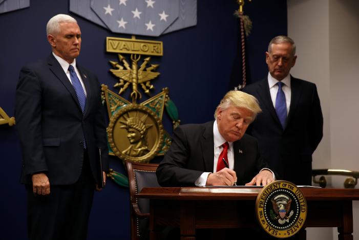 u s president donald trump signs an executive order he said would impose tighter vetting to prevent foreign terrorists from entering the united states at the pentagon in washington u s january 27 2017 photo reuters