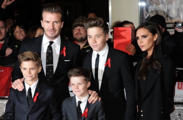 david beckham l victoria beckham r and their sons pose for picture photo afp