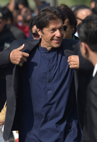 pakistani cricketer turned opposition leader and head of pakistan tehreek i insaf pti imran khan arrives at the supreme court to attend a hearing on the panama papers in islamabad on november 17 2016 photo afp pakistani cricketer turned opposition leader and head of pakistan tehreek i insaf pti imran khan arrives at the supreme court to attend a hearing on the panama papers in islamabad on november 17 2016 photo afp