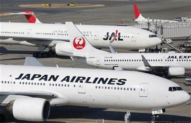 japan airlines aircrafts are parked on the tarmac at haneda airport in tokyo february 4 2013 photo reuters japan airlines aircrafts are parked on the tarmac at haneda airport in tokyo february 4 2013 photo reuters