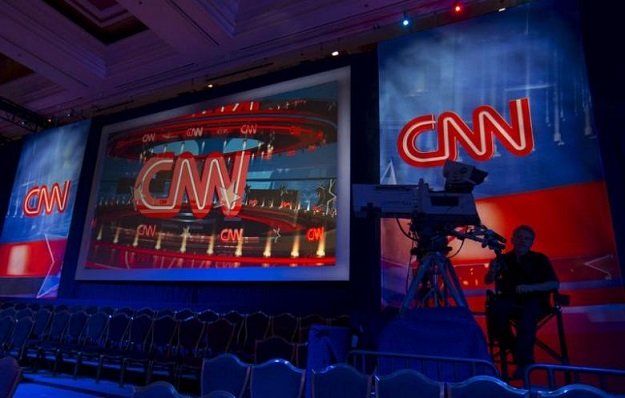 a cnn camera operator waits by his camera as the network prepares for the first democratic presidential candidate debate at the wynn hotel in las vegas nevada october 13 2015 photo reuters
