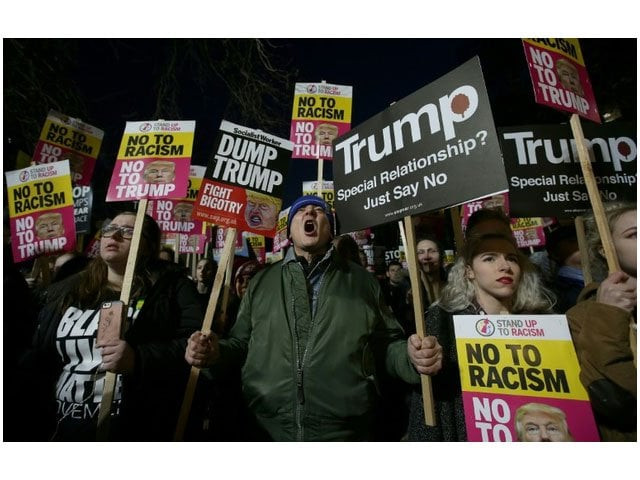 demonstrators held a mass protest outside the us embassy in london on january 20 to coincide with the inauguration of donald trump as the 45th president of the united states photo afp demonstrators held a mass protest outside the us embassy in london on january 20 to coincide with the inauguration of donald trump as the 45th president of the united states photo afp
