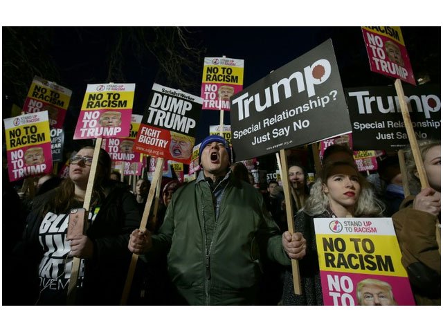 demonstrators held a mass protest outside the us embassy in london on january 20 to coincide with the inauguration of donald trump as the 45th president of the united states photo afp