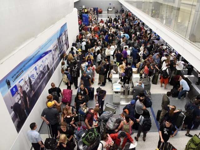 delayed passengers inside terminal 7 at los angeles international airport line up to go through tsa security check following a false alarm event in los angeles california us august 28 2016 photo reuters