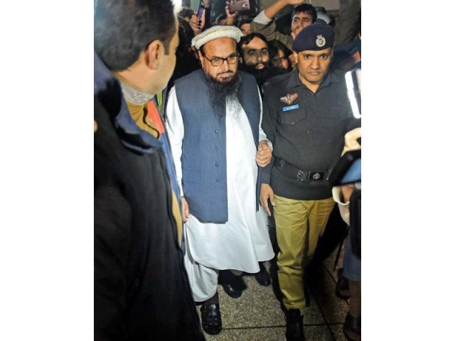 jud leader hafiz saeed leaves after being detained by police in lahore photo afp jud leader hafiz saeed leaves after being detained by police in lahore photo afp