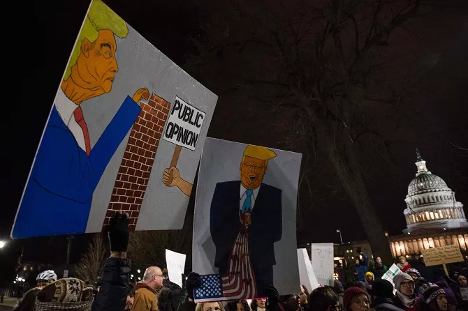 demonstrators protest against us president donald trump and his administration 039 s ban of travelers from 7 countries by executive order during a rally outside the us supreme court in washington dc on january 30 2017 photo afp demonstrators protest against us president donald trump and his administration 039 s ban of travelers from 7 countries by executive order during a rally outside the us supreme court in washington dc on january 30 2017 photo afp
