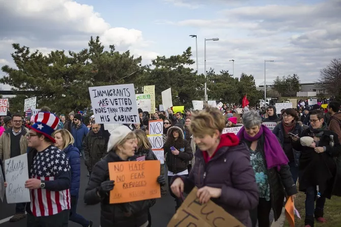demonstrators at philadelphia international airport protest against the executive order that president donald trump signed clamping down on refugee admissions and temporarily restricting travelers from seven predominantly muslim countries on january 29 2017 photo afp demonstrators at philadelphia international airport protest against the executive order that president donald trump signed clamping down on refugee admissions and temporarily restricting travelers from seven predominantly muslim countries on january 29 2017 photo afp