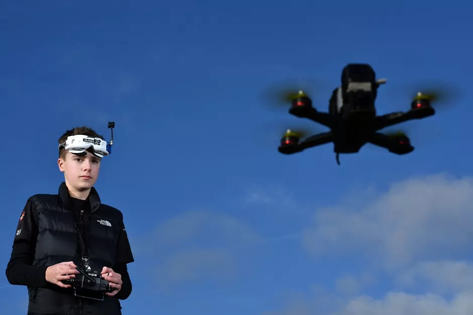 drone racing champion luke bannister poses for a photograph as he flies his first person view fpv drone in wiltshire western england on december 22 2016 photo afp drone racing champion luke bannister poses for a photograph as he flies his first person view fpv drone in wiltshire western england on december 22 2016 photo afp