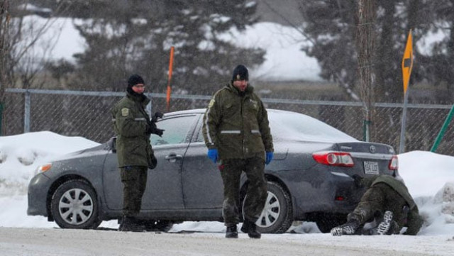 police officers patrol the perimeter at the scene of a fatal shooting at the quebec islamic cultural centre in quebec city canada january 30 2017 reuters mathieu belanger police officers patrol the perimeter at the scene of a fatal shooting at the quebec islamic cultural centre in quebec city canada january 30 2017 reuters mathieu belanger