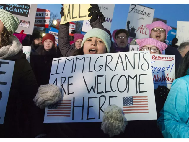 demonstrators protest against us president donald trump and his administration 039 s ban of travelers from 7 countries by executive order during a rally outside the us supreme court in washington dc on january 30 2017 photo afp demonstrators protest against us president donald trump and his administration 039 s ban of travelers from 7 countries by executive order during a rally outside the us supreme court in washington dc on january 30 2017 photo afp