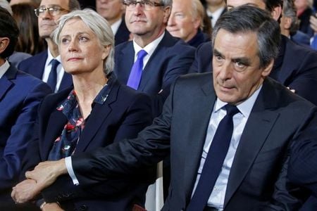 francois fillon member of les republicains political party and 2017 presidential candidate of the french centre right and his wife penelope attend a political rally in paris france january 29 2017 photo reuters