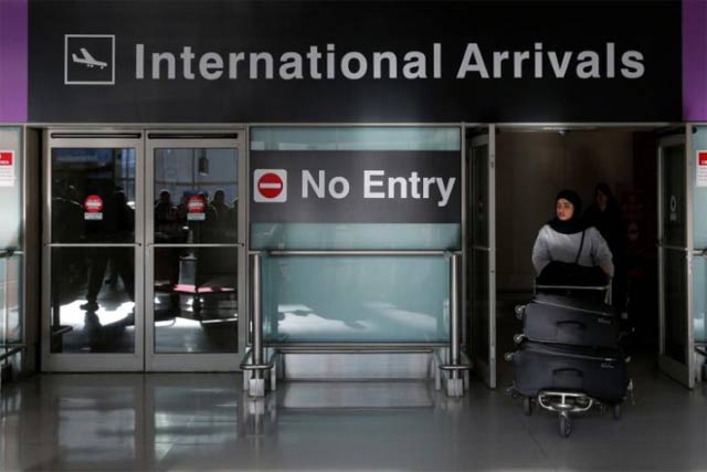 an international traveler arrives after u s president donald trump 039 s executive order travel ban at logan airport in boston massachusetts us january 30 2017 photo reuters
