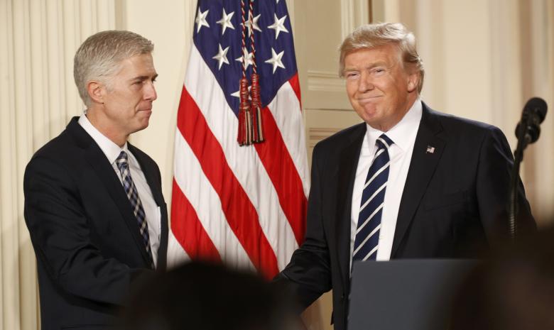 us president donald trump shakes hands with neil gorsuch after nominating him to be an associate justice of the u s supreme court at the white house in washington photo reuters