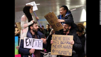 the story behind the viral photo of muslim and jewish children protesting trump