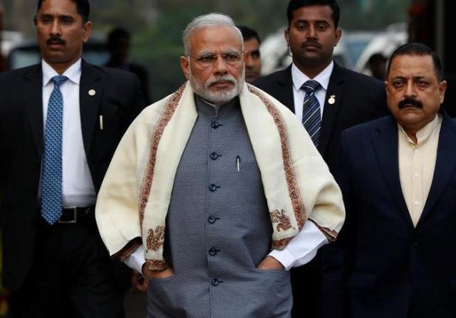 prime minister narendra modi walks to speak with the media as he arrives at the parliament house to attend the first day of the budget session in new delhi january 31 2017 photo reuters