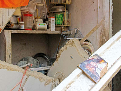 reduced to rubble house collapse in neelam colony claims two lives