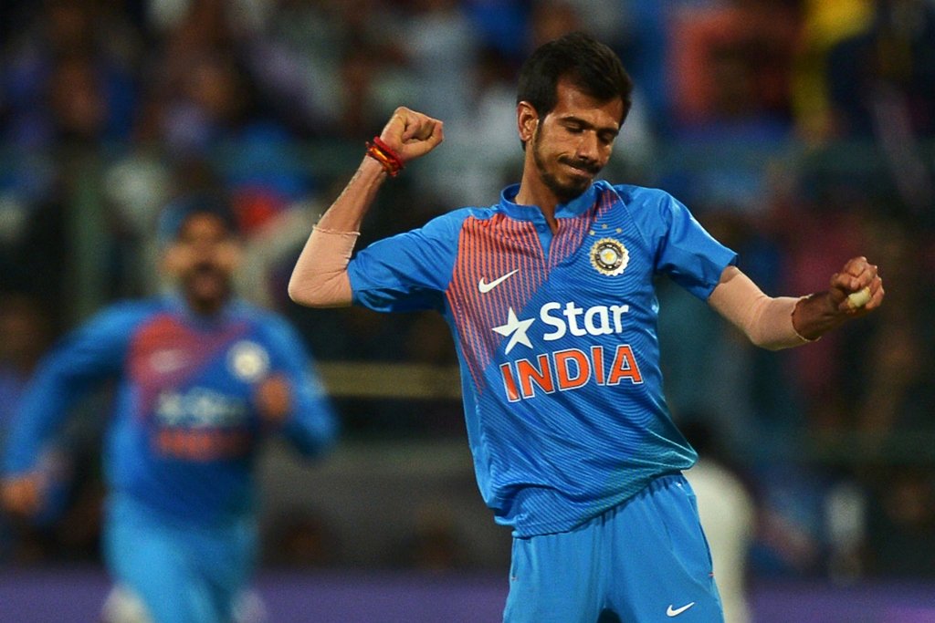 india 039 s chahal r celebrates the dismissal of england 039 s ben stokes at the chinnaswamy cricket stadium in bangalore on february 1 2017 photo afp