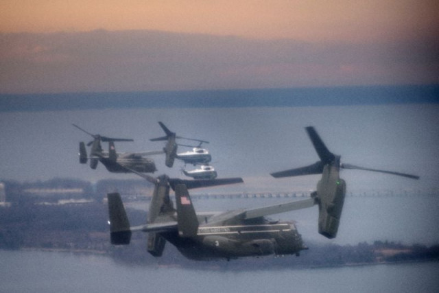 marine one carrying us president donald trump is escorted to dover air force base for the repatriation of navy seal team chief special warfare operator william quot ryan quot owens killed in a commando raid in yemen photo afp marine one carrying us president donald trump is escorted to dover air force base for the repatriation of navy seal team chief special warfare operator william quot ryan quot owens killed in a commando raid in yemen photo afp