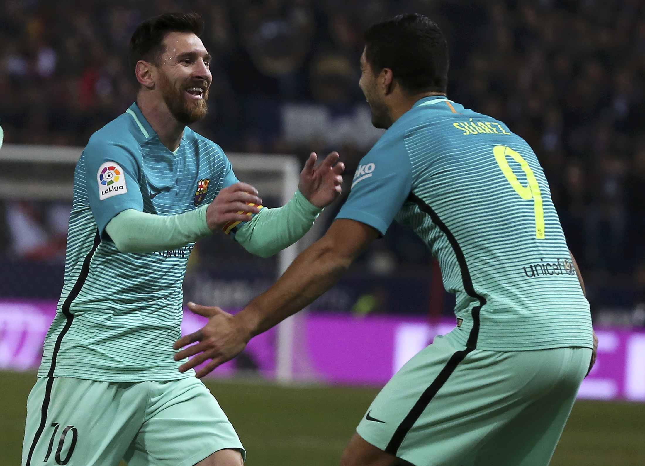 messi celebrates with suarez after scoring barcelona 039 s second goal photo reuters