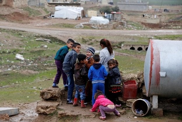 ayman c plays with other children after he was returned to his yazidi family in duhok iraq january 31 2017 photo reuters