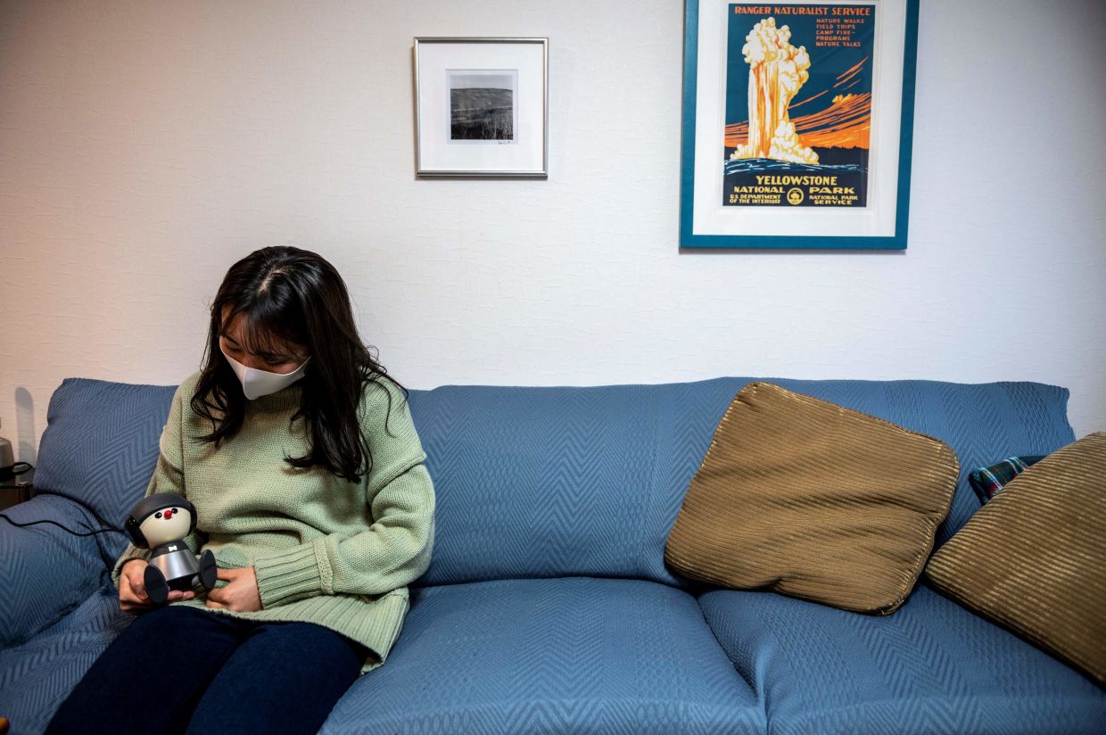 hamaura talking with communication robot charlie in her apartment in tokyo smart home assistants like amazon s alexa have found success worldwide but tech firms in japan are reporting huge demand for more humanlike alternatives as people seek solace during virus isolation photo afp