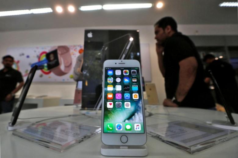 an iphone is seen on display at a kiosk at an apple reseller store in mumbai india photo reuters