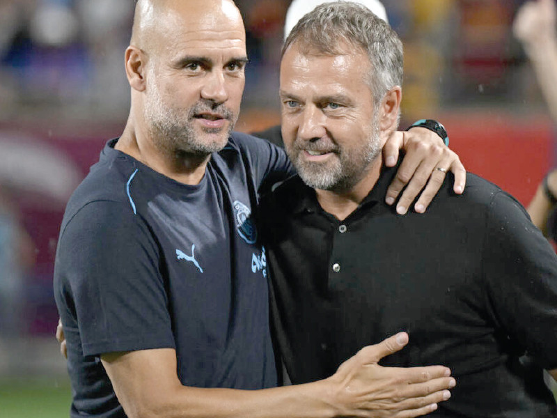 barcelona manager hansi flick right was facing off against former barca player and manager pep guardiola photo afp