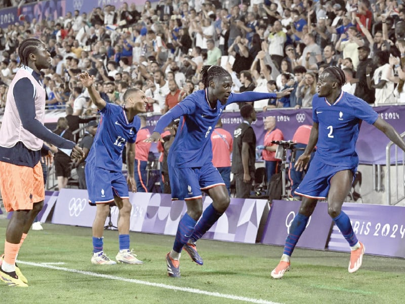 jean philippe mateta runs away in celebration after scoring for france against argentina photo afp