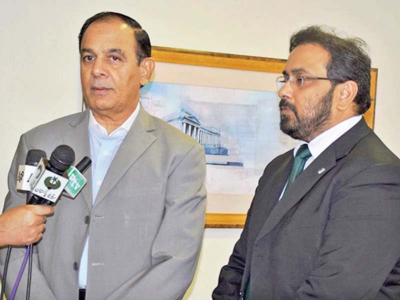 nab chairman qamar zaman chaudhry talks to the media photo online