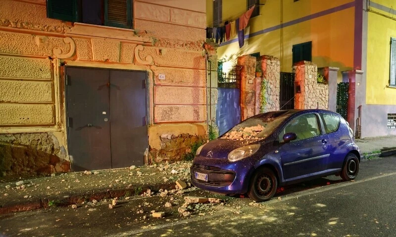 a damaged car is seen in the street after an overnight earthquake jolted naples in southern italy on march 13 2025 photo reuters a damaged car is seen in the street after an overnight earthquake jolted naples in southern italy on march 13 2025 photo reuters