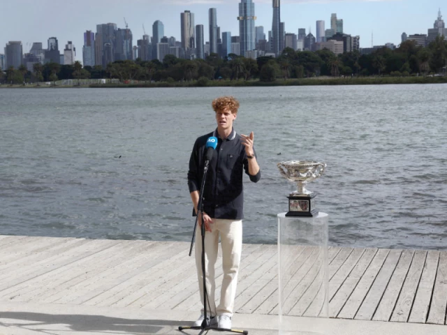 italy s jannik sinner set to face a doping hearing speaks at a media event alongside his australian open trophy in melbourne on monday photo afp italy s jannik sinner set to face a doping hearing speaks at a media event alongside his australian open trophy in melbourne on monday photo afp