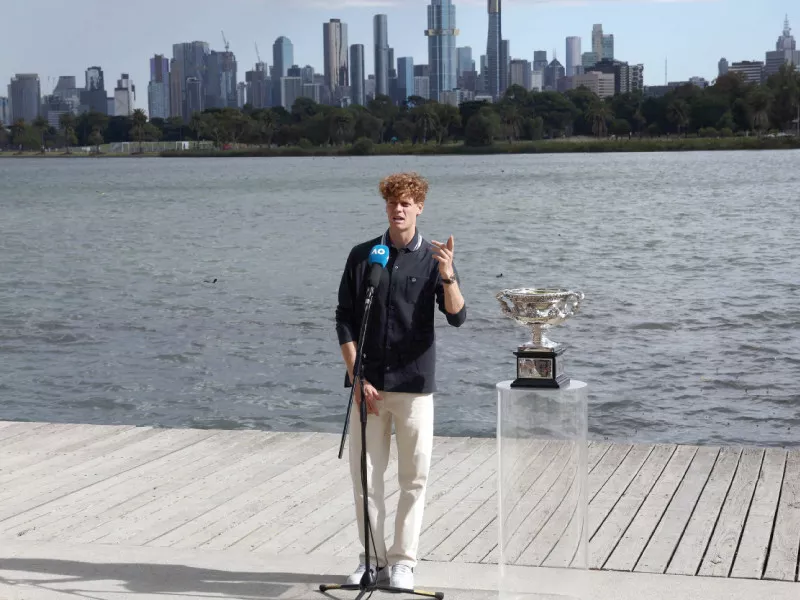 italy s jannik sinner set to face a doping hearing speaks at a media event alongside his australian open trophy in melbourne on monday photo afp italy s jannik sinner set to face a doping hearing speaks at a media event alongside his australian open trophy in melbourne on monday photo afp