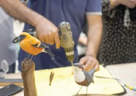 art enthusiasts learn woodcarving skills at workshop art enthusiasts learn woodcarving skills at workshop