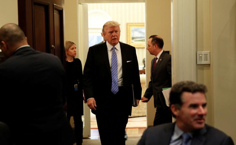 us president donald trump arrives for a meeting with business leaders in the roosevelt room of the white house in washington january 23 2017 photo reuters