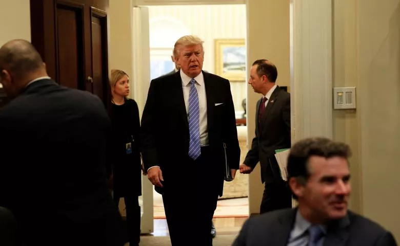 us president donald trump arrives for a meeting with business leaders in the roosevelt room of the white house in washington january 23 2017 photo reuters us president donald trump arrives for a meeting with business leaders in the roosevelt room of the white house in washington january 23 2017 photo reuters