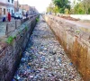 canals clogged as trash continues pouring in canals clogged as trash continues pouring in