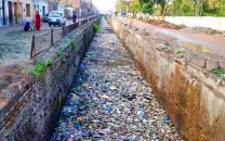 canals clogged as trash continues pouring in canals clogged as trash continues pouring in