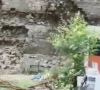 engineer suspended over collapsed wall