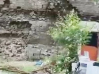 engineer suspended over collapsed wall