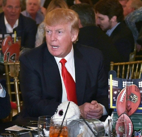 us president donald trump while watching super bowl li at trump international golf club palm beach in west palm beach florida on february 5 2017 photo afp