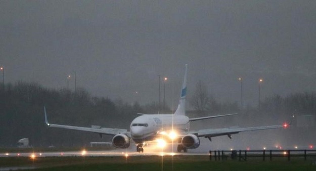 a chartered aircraft taxis after arriving with the first group of syrian refugees to be accepted by britain at glasgow airport in scotland november 17 2015 photo reuters