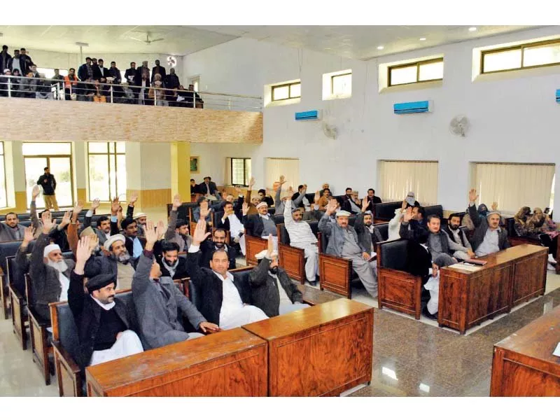 members of tehsil council raise their hands for a no confidence vote against naib nazim shujjah ahmed photo online members of tehsil council raise their hands for a no confidence vote against naib nazim shujjah ahmed photo online