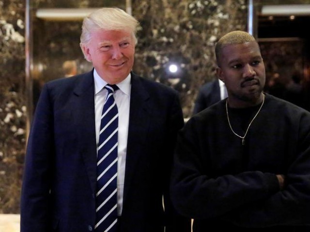 US President-elect Donald Trump and musician Kanye West pose for media at Trump Tower in Manhattan, New York City, US, December 13, 2016. REUTERS/Andrew Kelly